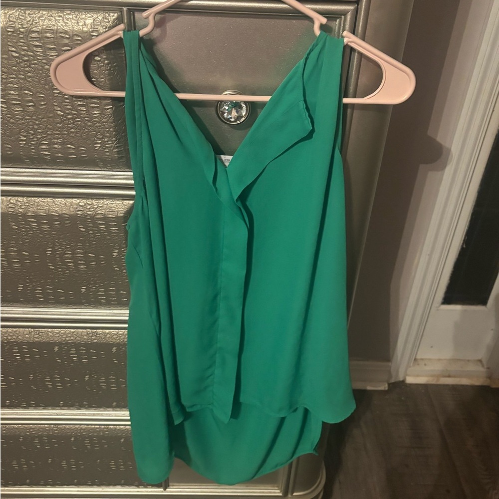 Carolina Belle Green Wrap Blouse with Asymmetrical Hem and Sleeveless Design